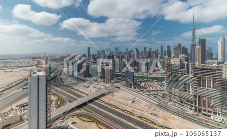 Panorama showing skyline of Dubai with business bay and downtown district timelapse. Panorama showing skyline of Dubai with business bay and downtown district timelapse. 106065137