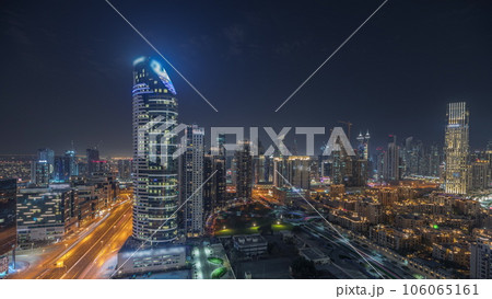 Panorama showing Dubai Downtown and business bay night timelapse with tallest skyscraper and other towers Panorama showing Dubai Downtown and business bay night timelapse with tallest skyscraper and other towers 106065161