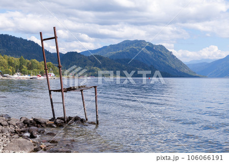 Teletskoye lake, coastal landscape with huge chair 106066191