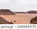 Planet Mars like landscape - Photo of Wadi Rum desert in Jordan with red pink sky above, this location was used as set for many science fiction movies 106068970