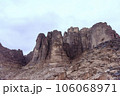 Planet Mars like landscape - Photo of Wadi Rum desert in Jordan with red pink sky above, this location was used as set for many science fiction movies 106068971
