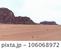 Planet Mars like landscape - Photo of Wadi Rum desert in Jordan with red pink sky above, this location was used as set for many science fiction movies 106068972