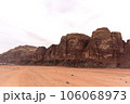 Planet Mars like landscape - Photo of Wadi Rum desert in Jordan with red pink sky above, this location was used as set for many science fiction movies 106068973