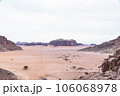 Planet Mars like landscape - Photo of Wadi Rum desert in Jordan with red pink sky above, this location was used as set for many science fiction movies 106068978