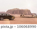 Planet Mars like landscape - Photo of Wadi Rum desert in Jordan with red pink sky above, this location was used as set for many science fiction movies 106068990