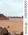 Planet Mars like landscape - Photo of Wadi Rum desert in Jordan with red pink sky above, this location was used as set for many science fiction movies 106069003