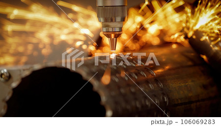 CNC Laser cutting of metal, modern industrial technology. 106069283