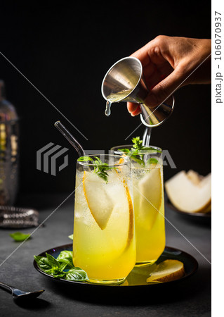 Melon juice, lemonade in glasses 106070937
