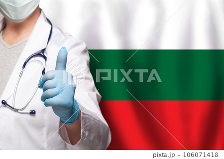 Bulgarian doctor's hand showing thumb up positive gesture on flag of Bugary background 106071418