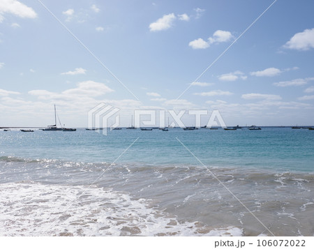 Atlantic Ocean with boats on Sal island in Cape Verde 106072022
