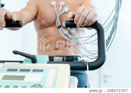 Patient during exercise ECG in health check Patient during exercise ECG in health check 106072307