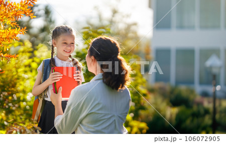 Parent and kid going to school Parent and kid going to school 106072905
