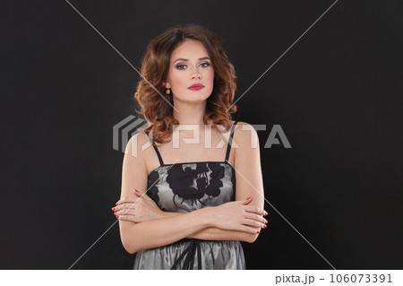 Beautiful successful woman brunette mode with makeup and brown wavy hairstyle  106073391