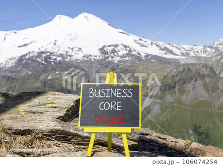 Business core values symbol. Concept words Business core values on beautiful chalk blackboard. Beautiful mountain Elbrus background. Business motivational business core values concept. Copy space. Business core values symbol. Concept words Business core values on beautiful chalk blackboard. Beautiful mountain Elbrus background. Business motivational business core values concept. Copy space. 106074254