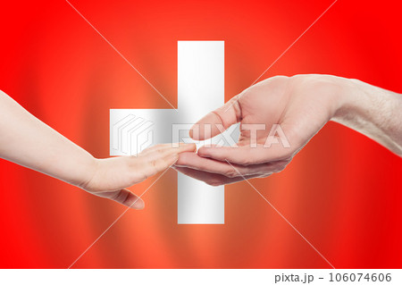 Swiss baby and parent hands on the background of flag of Switzerland Help, aid, support, concept Swiss baby and parent hands on the background of flag of Switzerland Help, aid, support, concept 106074606