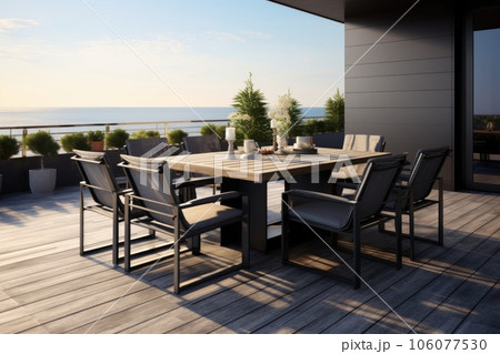 The terrace of a modern house and hotel. Luxury outdoor dining table with chairs 106077530