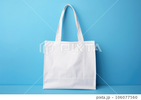 Mock-up of a white fabric bag with handles 106077560
