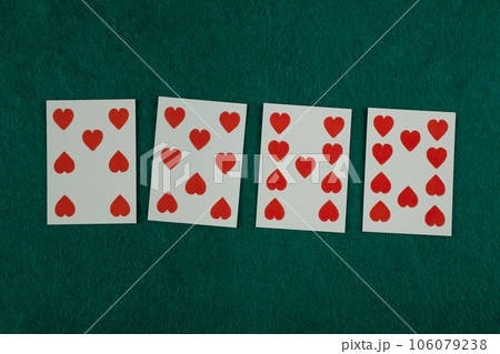 Old west era playing card on gambling table. Old west era playing card on gambling table. 106079238