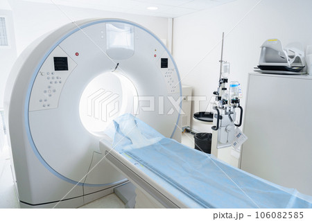 Interior of empty CT scan room in modern medical center is ready for procedure  106082585