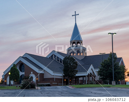 Sunset view of the St Monica Catholic Church 106083712