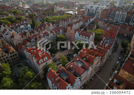 Beautiful panoramic architecture of old town in Gdansk, Poland at sunrise. Aerial view drone pov. Landscape cityscape City from Above. Small vintage historical buildings Europe Tourist Attractions 106084472