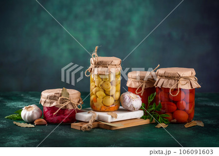 Pickled vegetables in glass jars. Pickled vegetables in glass jars. 106091603