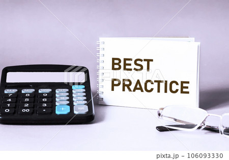 Best practice text concept on notepad and light background with marks and calculator Best practice text concept on notepad and light background with marks and calculator 106093330