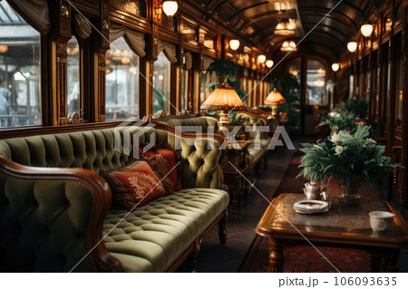Velvet seats inside a train car in the style of luxury, with a table and windows, sunlight shines through the windows. Generative AI 106093635