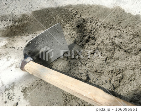 Mixing together to make a strong concrete floor 106096861