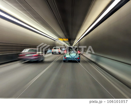 driving through highway tunnel abstract view 106101057