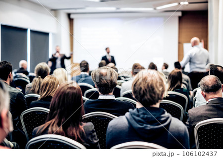 I have a question. Group of business people sitting at the chairs in conference hall. Businessman standing up asking a question. Conference and Presentation. Business and Entrepreneurship. I have a question. Group of business people sitting at the chairs in conference hall. Businessman standing up asking a question. Conference and Presentation. Business and Entrepreneurship. 106102437