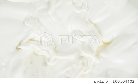 Freeze motion of whirling milk cream, close-up Freeze motion of whirling milk cream, close-up 106104402