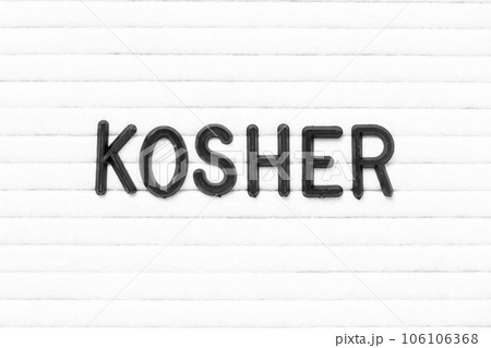 Black color letter in word kosher on white felt board background Black color letter in word kosher on white felt board background 106106368