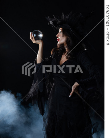 Witch sorceress with crystal ball Witch sorceress with crystal ball 106107601