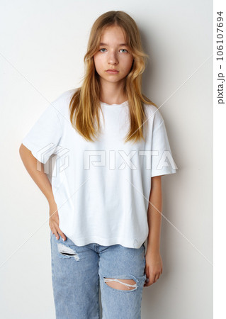 Portrait of young beautiful cute teen girl posing at camera 106107694