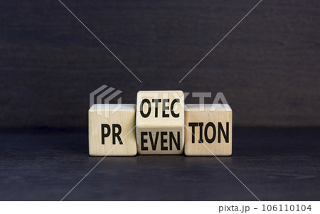 Protection and prevention symbol. Concept word Protection Prevention on wooden cubes. Beautiful grey table grey background. Business protection prevention concept. Copy space. 106110104