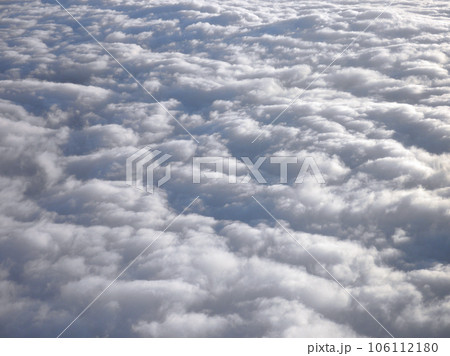 On top of fluffy curvy clouds 106112180