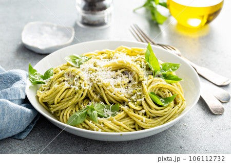 Basil pesto pasta with parmesan and olive oil 106112732