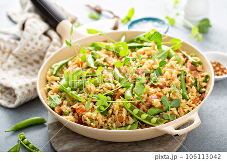 Breakfast fried rice with bacon and peas Breakfast fried rice with bacon and peas 106113042