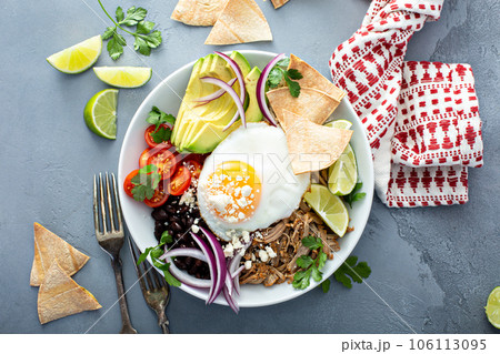 Breakfast burrito bowl with pork carnitas and rice Breakfast burrito bowl with pork carnitas and rice 106113095
