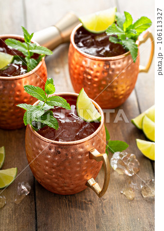 Traditional Moscow Mule in classic copper mugs 106113327