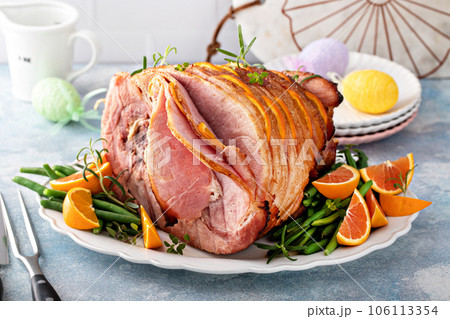 Traditional Easter ham with orange honey glaze 106113354