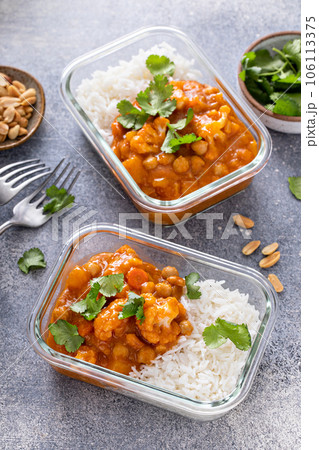 Vegan meal prep idea vegetable and chickpeas curry with rice 106113375