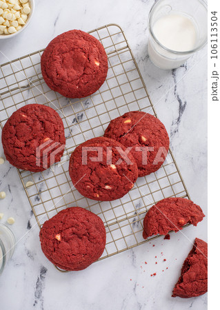 Red velvet cookies with white chocolate chips with milk 106113504
