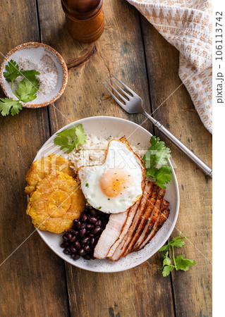 Caribbean or latin american breakfast with rice, beans and pork 106113742