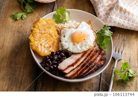 Caribbean or latin american breakfast with rice, beans and pork 106113744