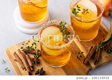 Hard apple cider cocktail with cinnamon and thyme, fall drink 106114018