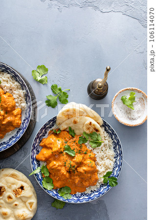Chicken tikka masala, cooked marinated chicken in spiced curry sauce 106114070