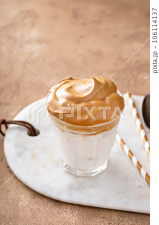 Dalgona whipped coffee with dairy or almond iced milk 106114137