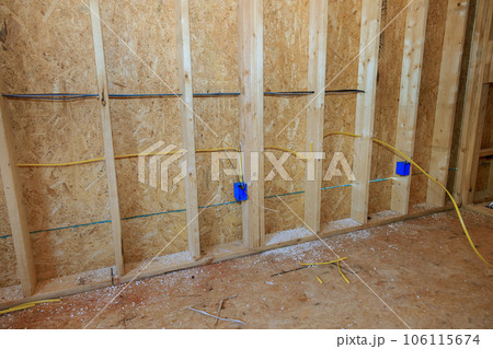 Inside electrical box wiring in new home under construction Inside electrical box wiring in new home under construction 106115674